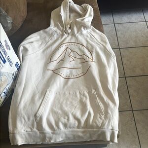 White Hoodie with Mountain Graphic under armour